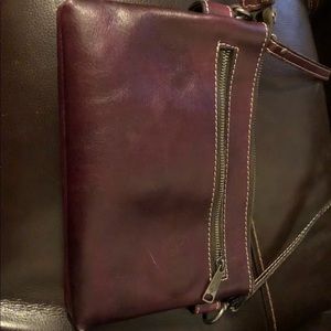 Purple Patricia Nash cross body bag.